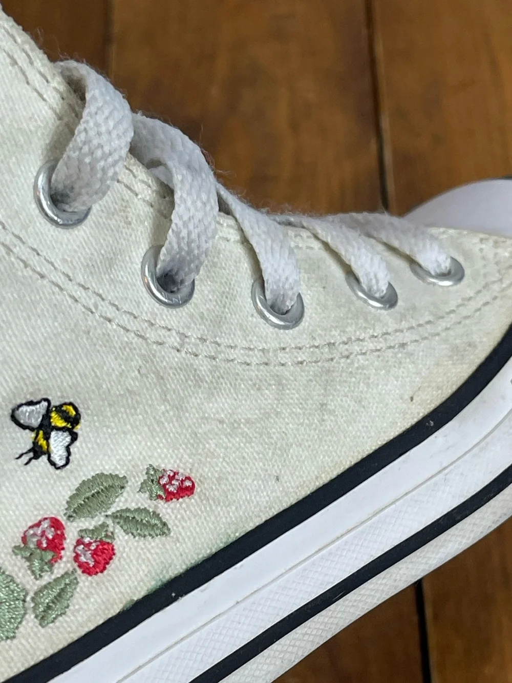 Converse kids size 12 cream colored strawberry embroidered high top sneakers